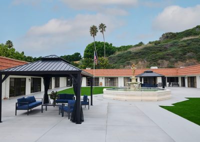 shaded seating area and the outside fountain at La Jolla Nursing and Rehab