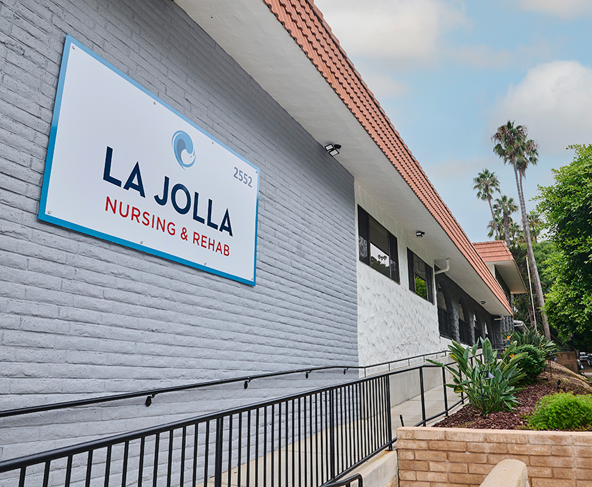The front of the La Jolla Nursing and Rehab facility with sign